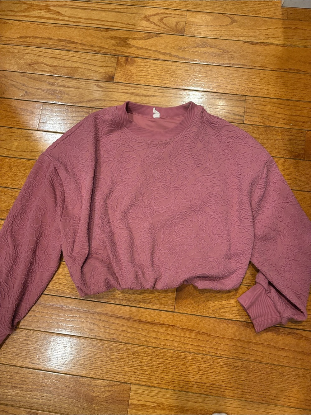 Anthropologie mauve bubble hem cropped sweatshirt with floral texture